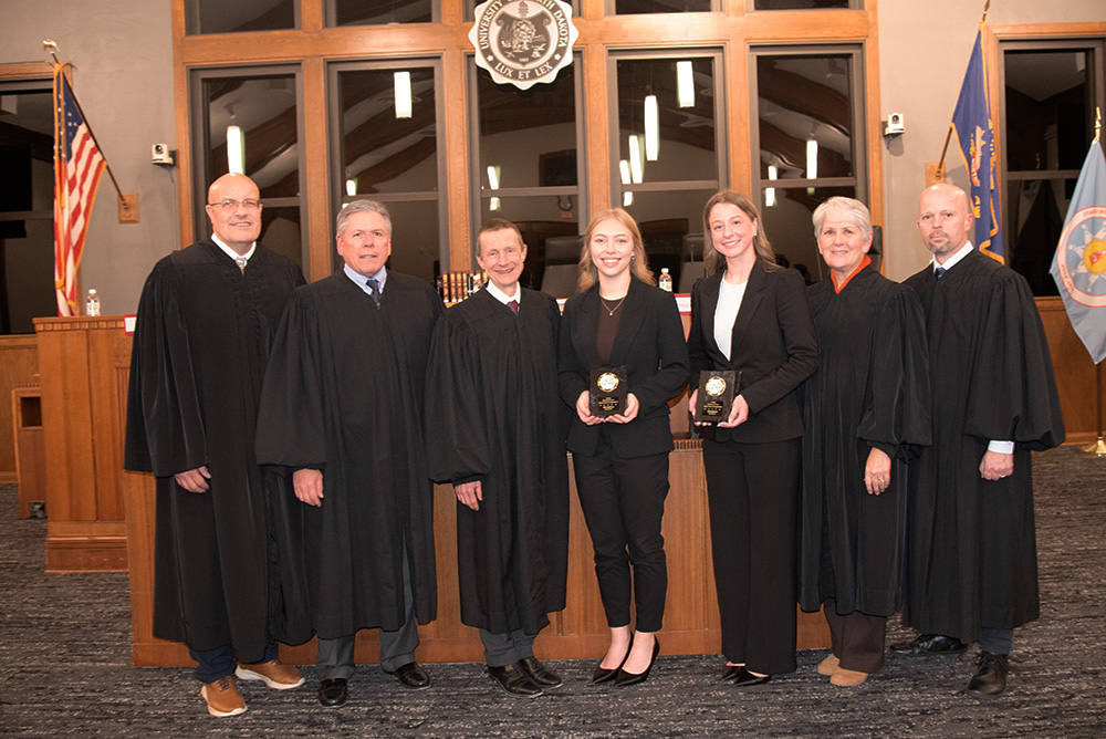 Justice Douglas Bahr, Justice Daniel Crother, Chief Justice Jon Jensen, Kylie Hartje, Murphy Landa, Justice Lisa Fair McEvers, Justice Jerod Tufte.