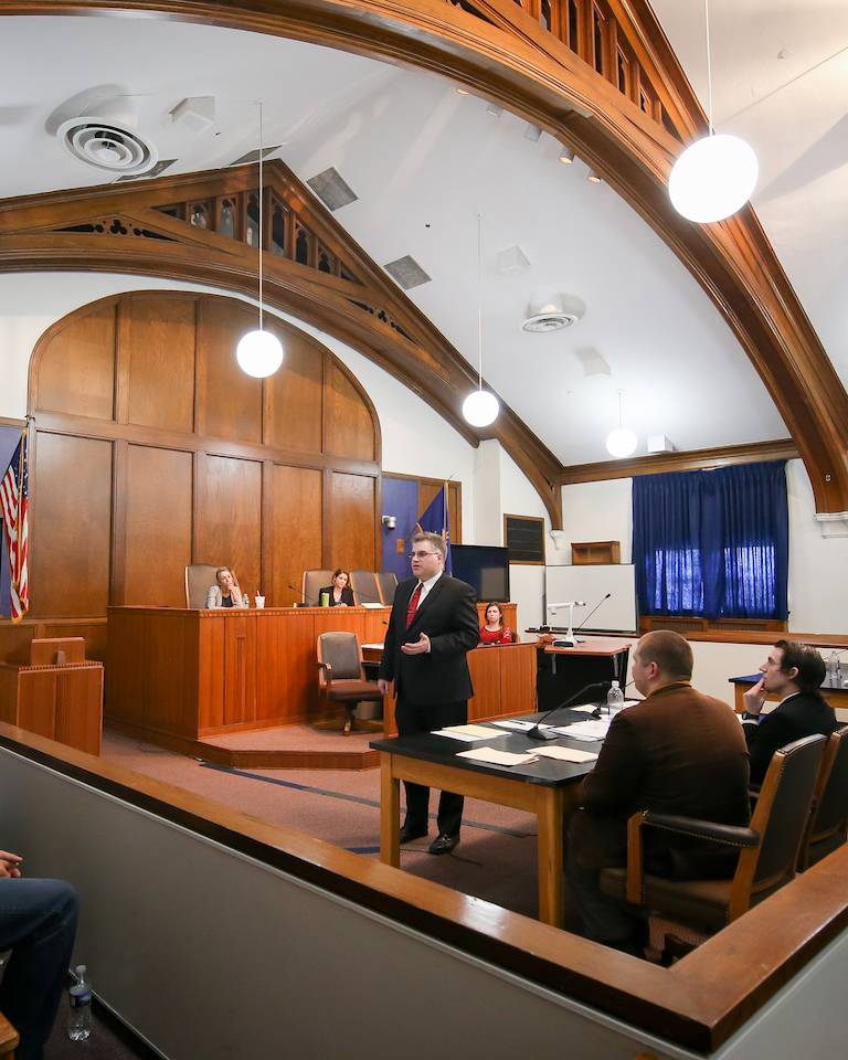 und law students in courtroom