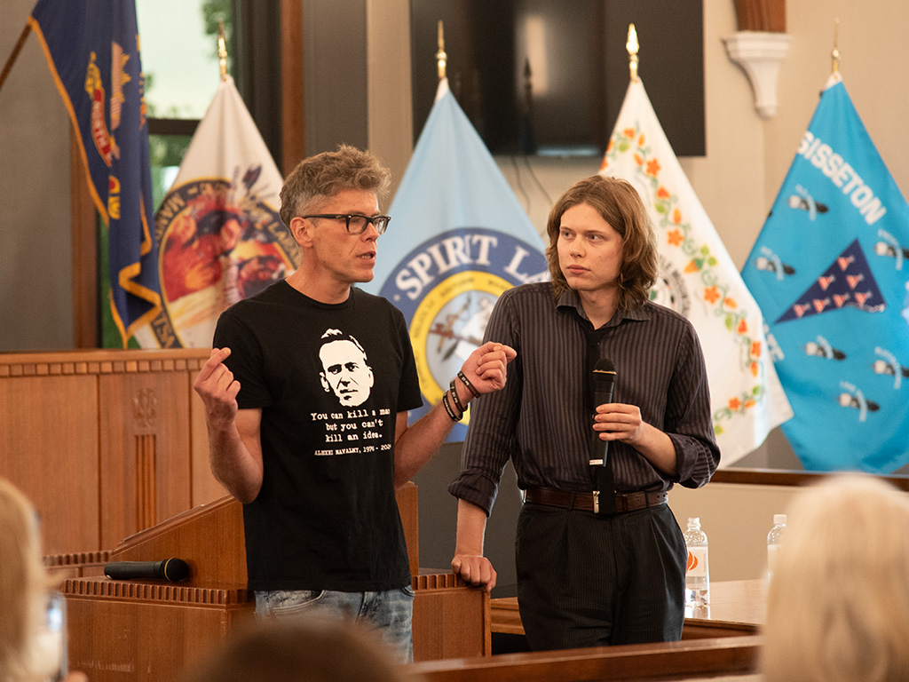 Judge Igor Tuleya delivers the 2024 Fode Lecture while his son, Iwo Tuleya, translates 