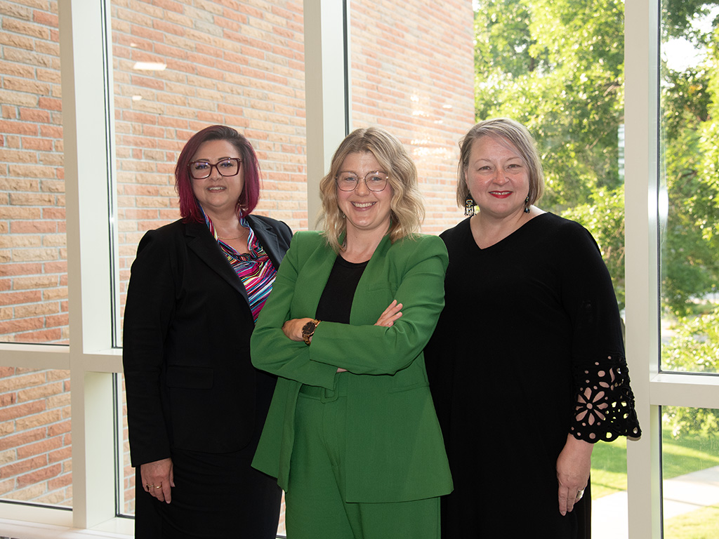 Legal writing professors, Carolyn Williams, Jennifer Cook, and Kimberly Dasse